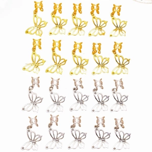 Anelli per capelli a farfalla in oro e argento con design traforato e strass