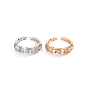 Crossed O-shape adjustable rings with zircon inlays in silver and rose gold finishes