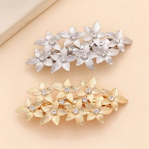 Luxurious vintage metal flower hair clips with sparkling rhinestones in gold and silver