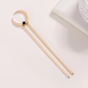 Épingle à cheveux lune dorée avec pierre noire et design à double branche