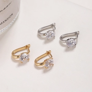Elegant 4-prong moissanite hoop earrings in gold and silver finish with round cut stones