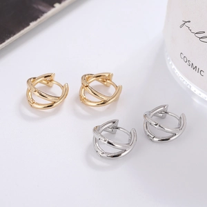 Minimalist double line twisted hoop earrings set in gold and silver finish for women