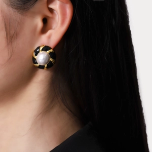 Vintage style gold-plated round stud earrings with pearl center and black enamel detail