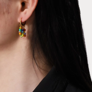 Colorful beaded hoop earrings with smiley face charm and vibrant bohemian style beads
