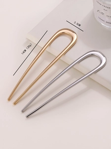 Detail view of U-shaped metal hairpins in gold and silver finish showing 14cm length