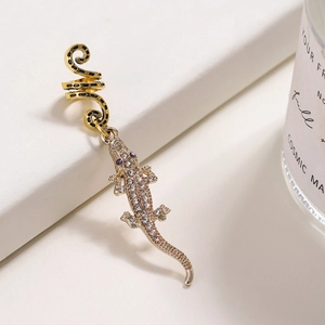 Pince à cheveux crocodile gothique avec strass brillants et yeux violets