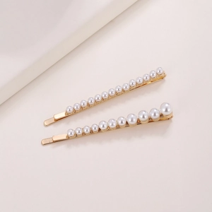 Set de barrettes dorées élégantes avec perles blanches au design linéaire et dégradé