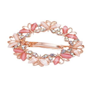Barrette à cheveux évidée en or rose avec motifs papillons roses et strass colorés
