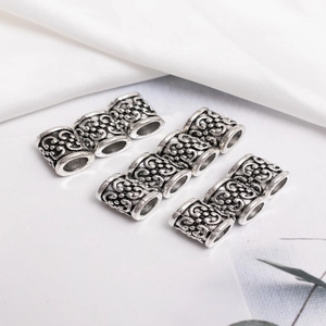 Lot de 9 perles tubulaires en métal argenté gravé pour tresses et bijoux artisanaux