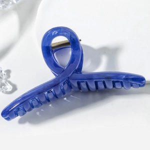 Minimalist dark blue marble textured hair claw clip with strong metal spring for women
