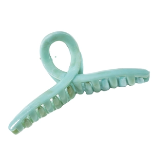 Mint green marble textured hair claw clip with cross-teeth design and metal spring