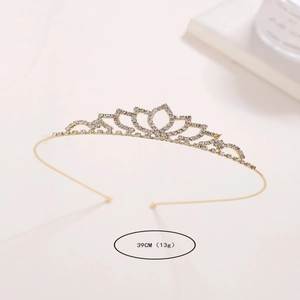Elegant gold bridal crown with heart-shaped white rhinestones for wedding hair styling