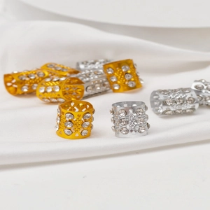 Bijoux de cheveux creux pour dreadlocks avec strass en finitions dorée et argentée
