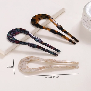 Three-piece U-shaped acetate hair pins in tortoiseshell, floral, and marble patterns