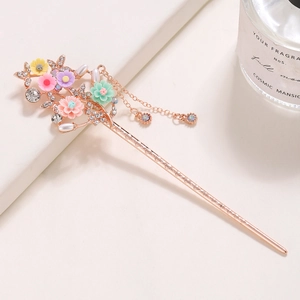 Vintage floral hair stick with colorful blossoms, pearls, and tassel chains in rose gold