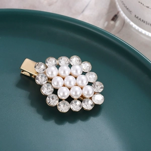 Elegant gold flower hair clip with white pearls and sparkling rhinestones for women