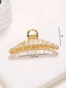 Vue détaillée de la pince à cheveux dorée de 11 cm avec dimensions et poids spécifiques