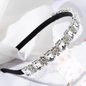 Elegant black satin headband with large rectangular crystals and silver pavé accents