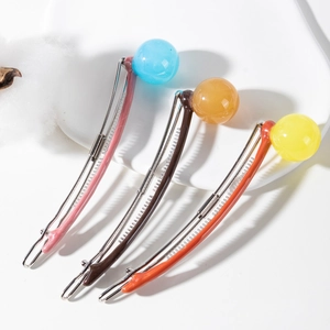 Three-piece set of stylish ball hair clips with colorful spherical accents and metal base