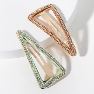 Detailed close-up of luxury triangle BB hair clips with colorful rhinestones and beads