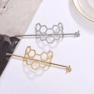 Irregular honeycomb hair sticks set in gold and silver finish with bee design