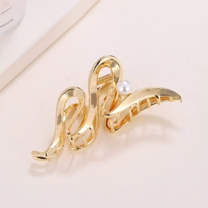 Elegant gold wave metal hair claw clip with pearl accent for thick hair styling
