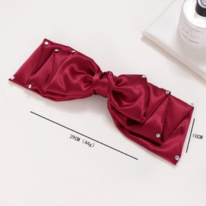 Grande pince à cheveux élégante en satin bordeaux avec strass blancs et design étagé