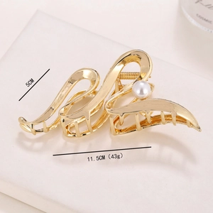 Elegant gold wave metal hair claw clip with a single pearl accent for long hair