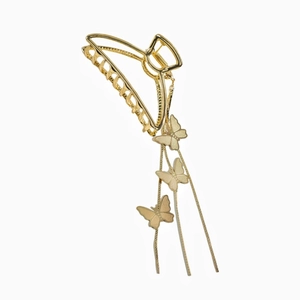 Elegante fermaglio per capelli in metallo dorato con nappe a farfalla e design a squalo cavo