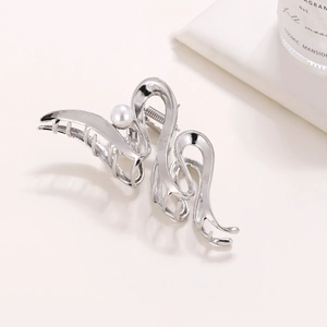 Silver wavy metal shark hair claw clip with pearl detail for thick hair styles