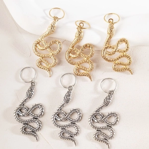 Barrettes à cheveux serpent spirale dorées et argentées avec textures d'écailles