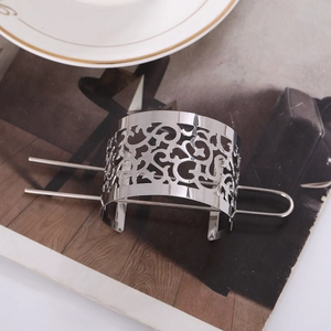 Vintage hollow silver metal hair bun crown and stick pin with intricate filigree patterns