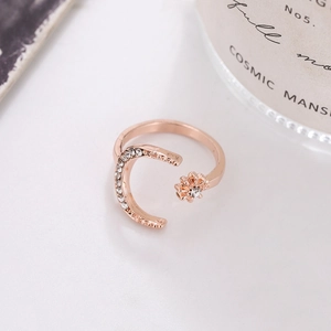 Rose gold crescent moon and star open ring with white rhinestones in elegant setting