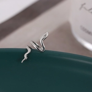 Silver snake-shaped double-layer cuff ring with textured skin and spiral design