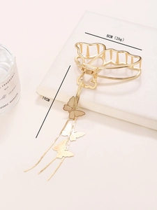 Detailansicht goldener Schmetterlings-Haarclip mit Quastenanhänger und Größenangaben
