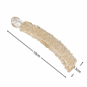 Pince banane champagne dorée avec strass scintillants d'une longueur de 10 cm