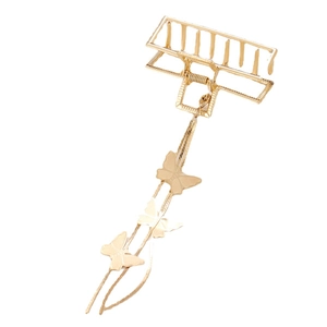 Goldene Haarklammer aus Metall mit rechteckigem Design und langen Schmetterlingsquasten