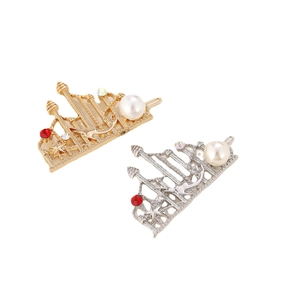 Vintage style hair clips with large white pearl, red rhinestone and star charms