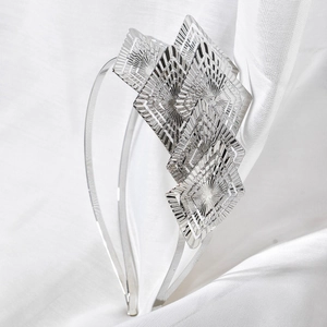 Baroque style silver leaf headband with layered geometric diamond shapes and laser engraving