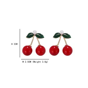 Cute red cherry earrings with gold stems and white pearls, size 3cm high by 2.5cm wide