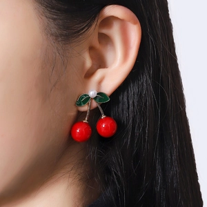 Cute red cherry earrings with green leaves and white pearls for a trendy summer look