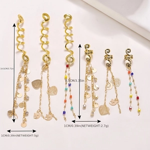 Detail showing dimensions of golden dreadlock spirals with stone and heart charms