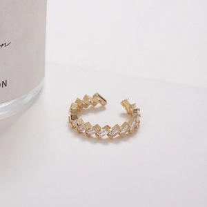 Fashionable gold open ring featuring geometric Z-shape set with sparkling cubic zirconia
