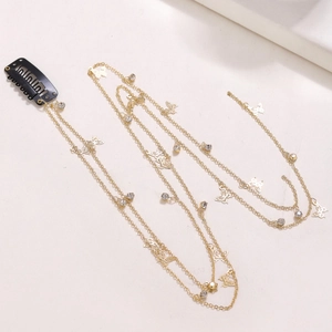 Handmade golden chain hair clip with butterfly charms and rhinestones for styling