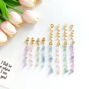 Detailed view of DIY alloy dreadlock spiral clips with natural stone beads for hair