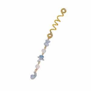 Close-up of golden spiral hair clip with blue and white natural stones for braids