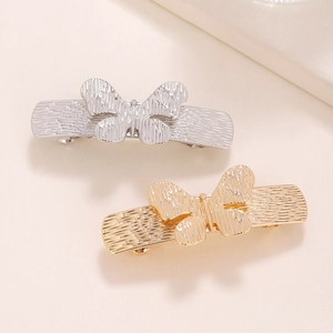 Retro hollow metal butterfly hair clip set in gold and silver with brushed texture finish