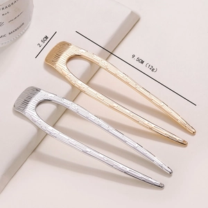 U-förmiges Haarnadel-Set aus Metall in Gold und Silber mit eleganten Gravuren