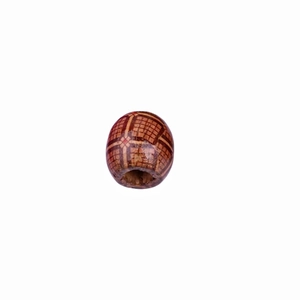 Close-up of brown wooden bead with grid pattern for DIY hair braiding and crafts