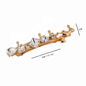 Barrette à cheveux futuriste en métal doré avec strass et design de lave minimaliste